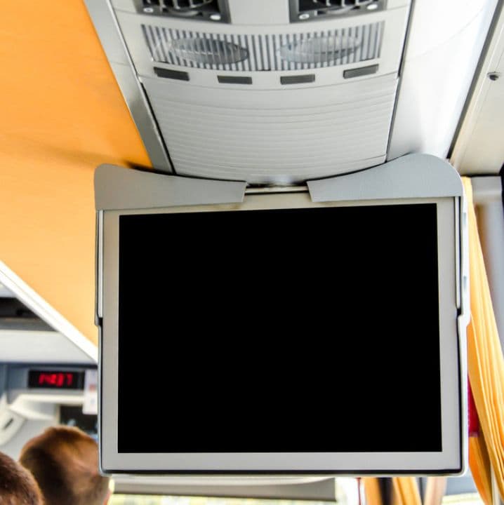 a blank tv screen on a charter bus