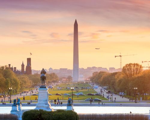 the national mall in washington dc at sunset